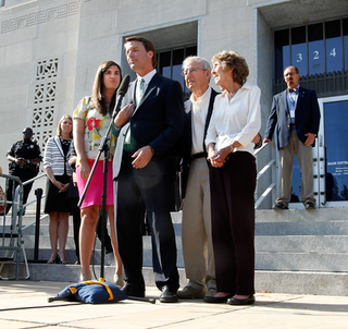 John Edwards, with his daughter and parents, addresses the media outside the federal courthouse in Greensboro, N.C. (Getty Images)